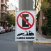 Cartel No estacionar llamo guinche